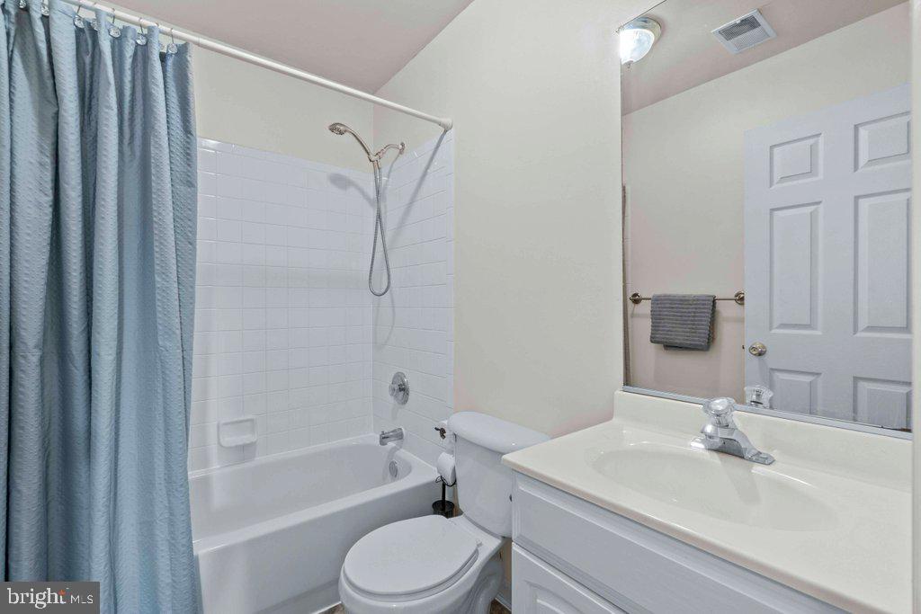 4305 Silver Spring Road Perry Hall, MD 21236 - Photo 31 of 48 a bathroom with a sink a toilet and shower