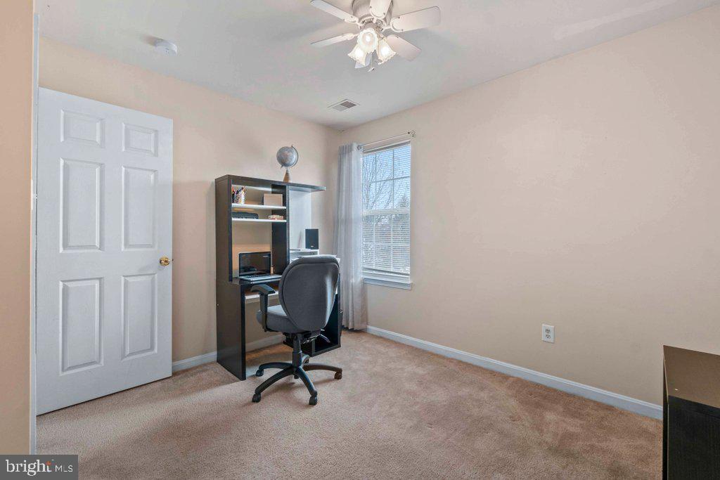 4305 Silver Spring Road Perry Hall, MD 21236 - Photo 32 of 48 a view of a workspace with furniture and a window