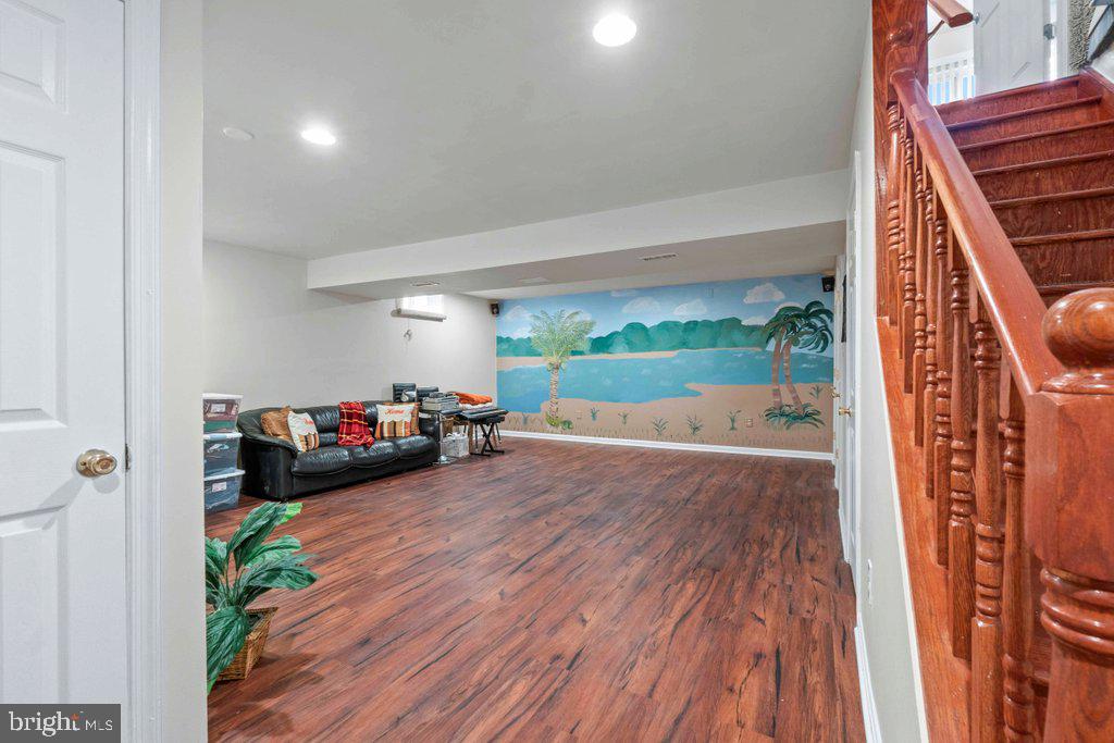 4305 Silver Spring Road Perry Hall, MD 21236 - Photo 36 of 48 a view of a livingroom with furniture and hardwood floor