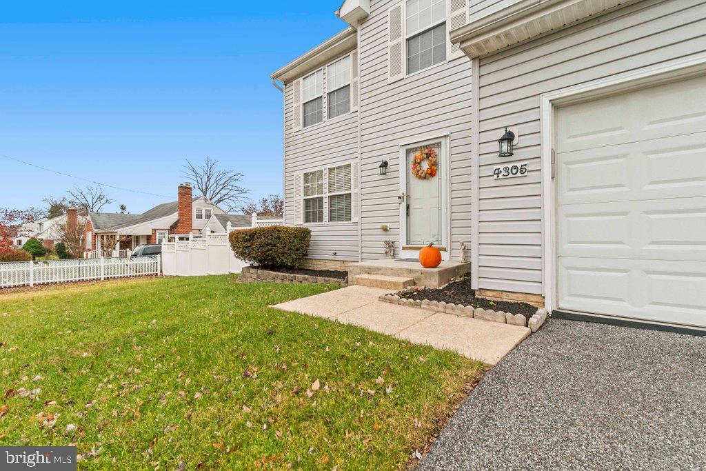 4305 Silver Spring Road Perry Hall, MD 21236 - Photo 4 of 48 a backyard of a house with table and chairs