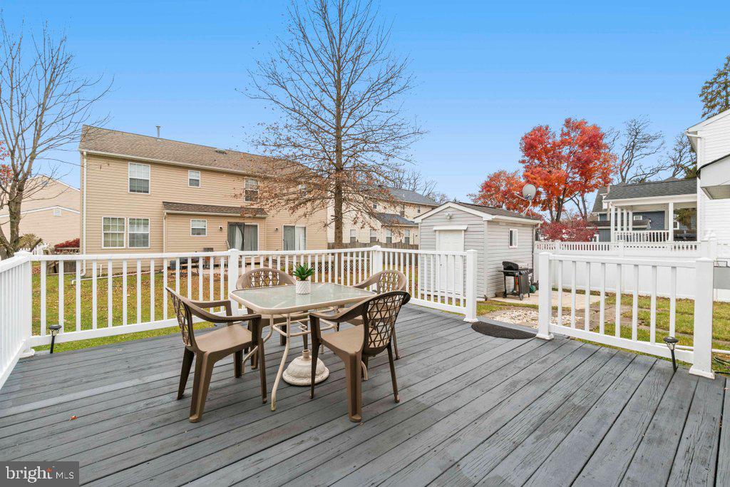 4305 Silver Spring Road Perry Hall, MD 21236 - Photo 42 of 48 a view of a house with a deck and furniture