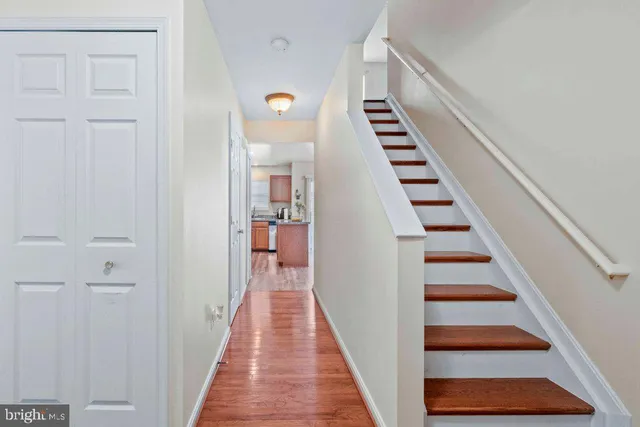 a view of a hallway with front door