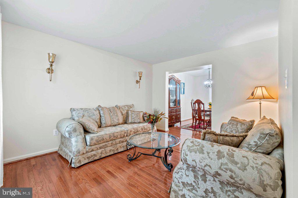 4305 Silver Spring Road Perry Hall, MD 21236 - Photo 8 of 48 a living room with furniture and wooden floor