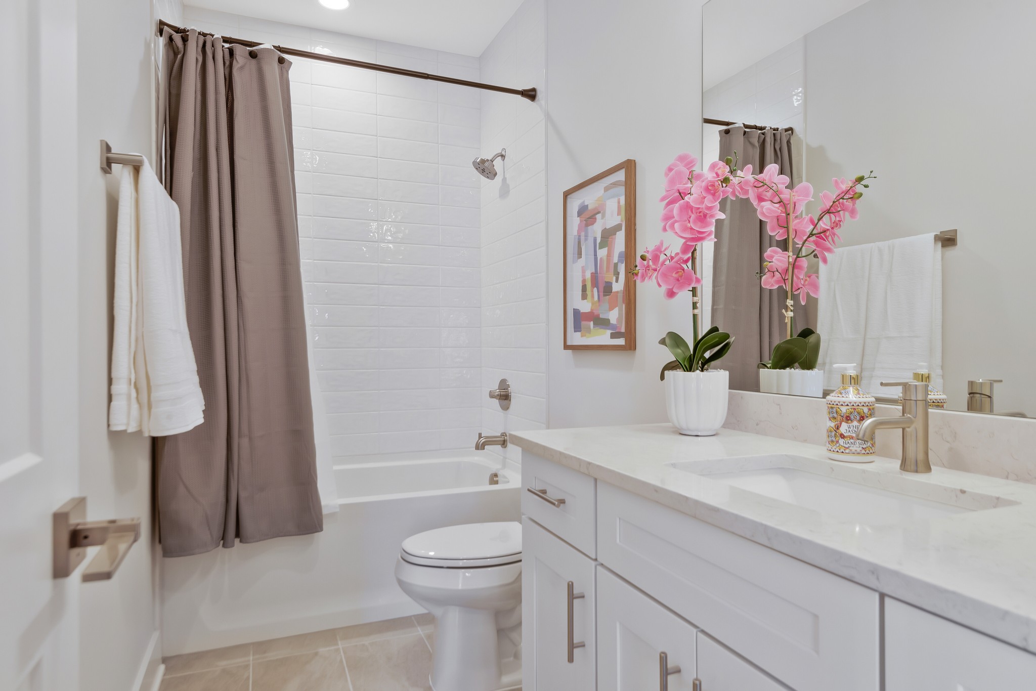 2176 Carson Street, Unit 3 Nashville, TN 37211 - Photo 16 of 44 a bathroom with a granite countertop sink a mirror a shower and a bath tub