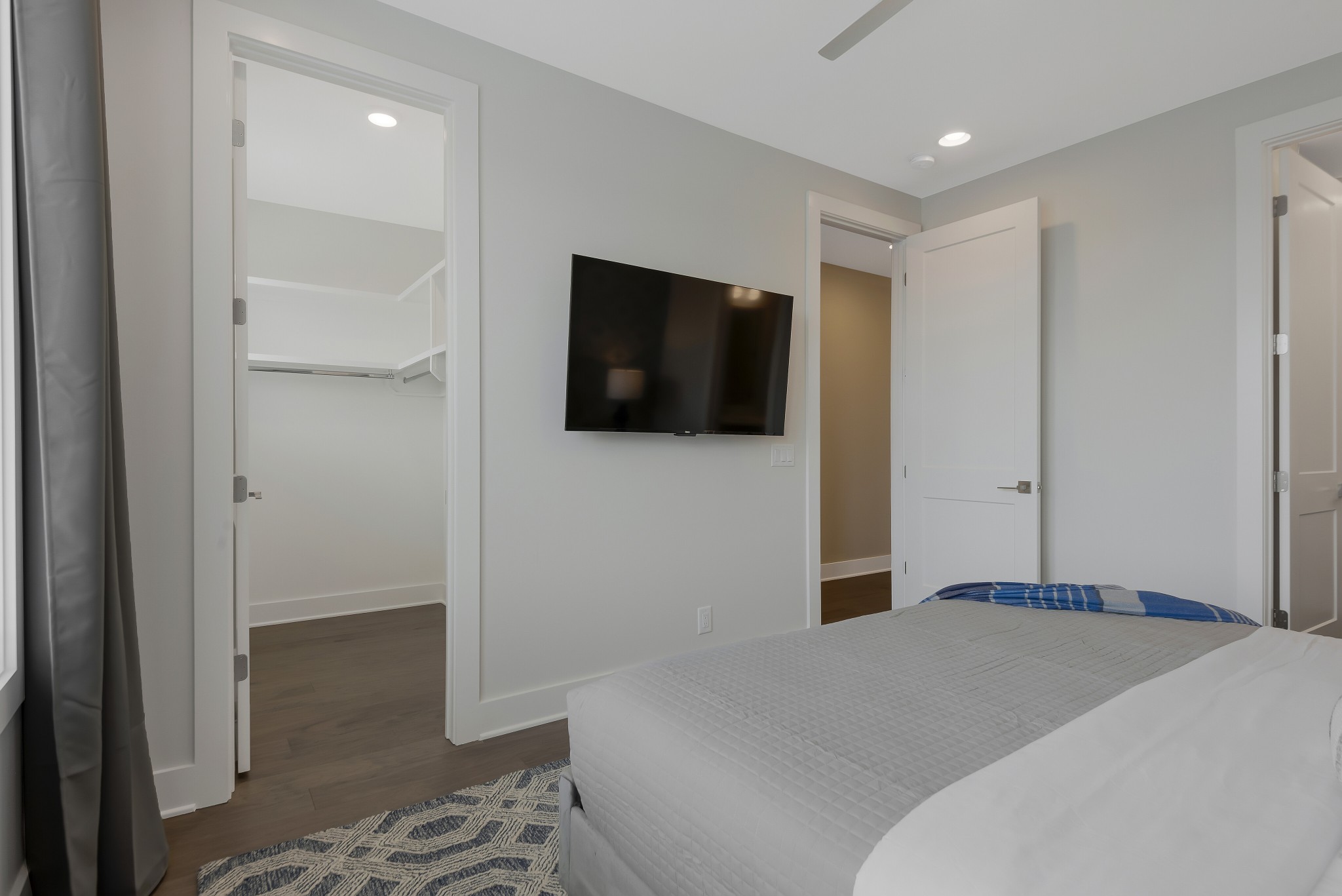 2176 Carson Street, Unit 3 Nashville, TN 37211 - Photo 34 of 44 a bedroom with a bed and a flat screen tv