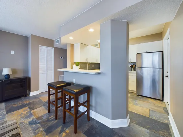 a view of a dining room with furniture