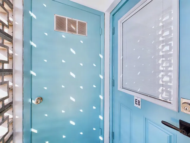 a view of a glass door in a room
