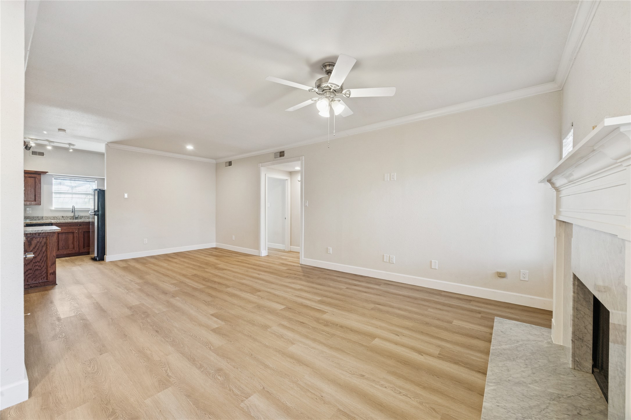 4041 Law Street, Unit 512 Houston, TX 77005 - Photo 3 of 15 a view of an empty room with a fireplace