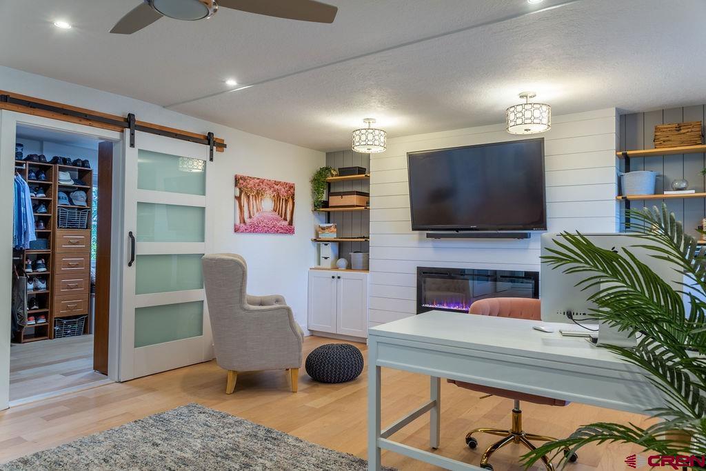 269 Fir Drive Durango, CO 81301 - Photo 17 of 23 a living room with furniture and a flat screen tv