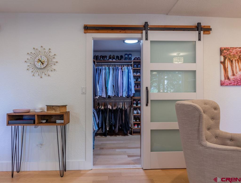 269 Fir Drive Durango, CO 81301 - Photo 18 of 23 a view of entryway and hall with wooden floor