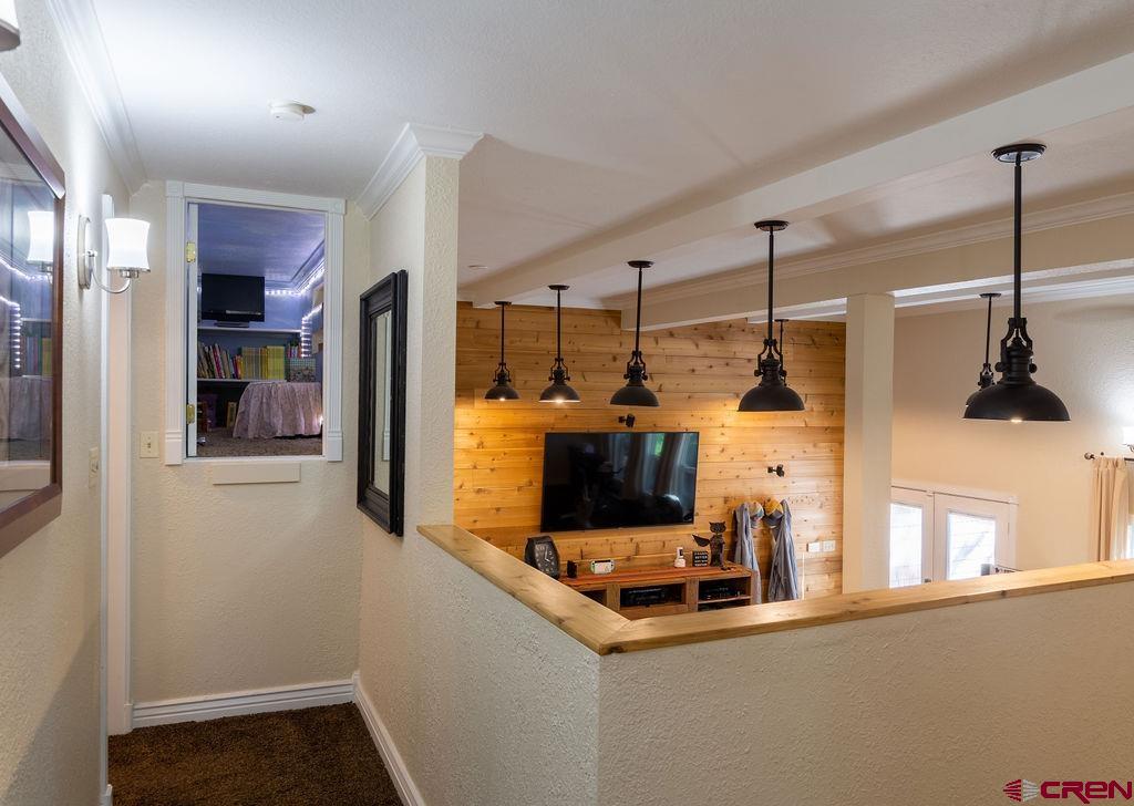 269 Fir Drive Durango, CO 81301 - Photo 19 of 23 a kitchen with stainless steel appliances granite countertop a refrigerator and a sink