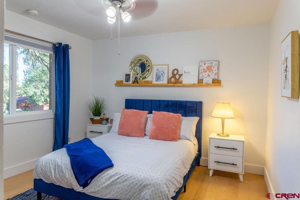 269 Fir Drive Durango, CO 81301 - Photo 22 of 23 a bedroom with a bed and a window