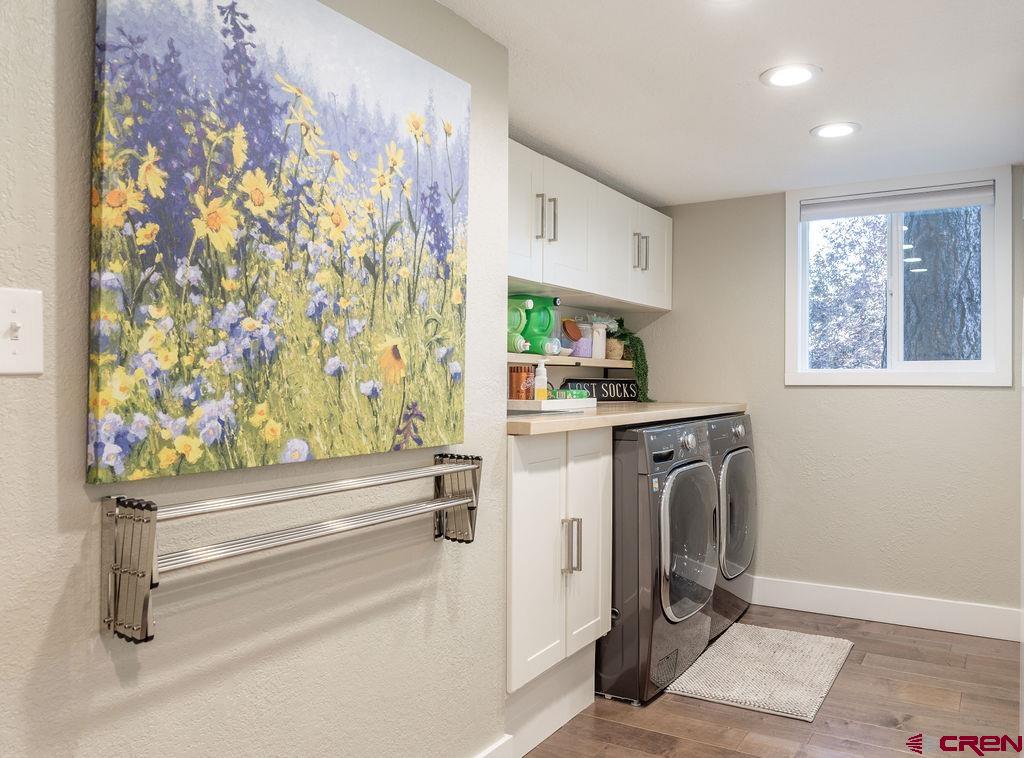 269 Fir Drive Durango, CO 81301 - Photo 6 of 23 a kitchen with stainless steel appliances a refrigerator and a stove top oven