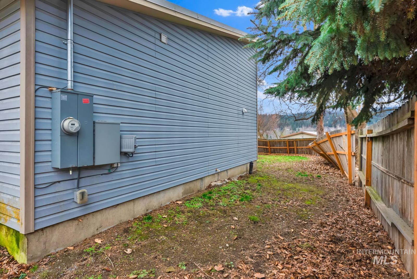 4715 West Reeves Street Coeur D'Alene, ID 83814 - Photo 20 of 24 View of property exterior with a fenced backyard