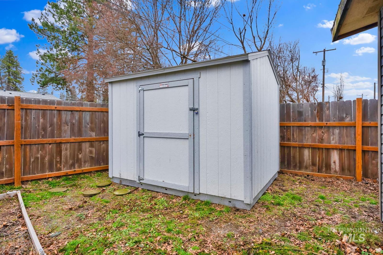4715 West Reeves Street Coeur D'Alene, ID 83814 - Photo 24 of 24 View of shed with a fenced backyard