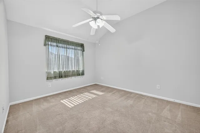 a view of empty room with windows