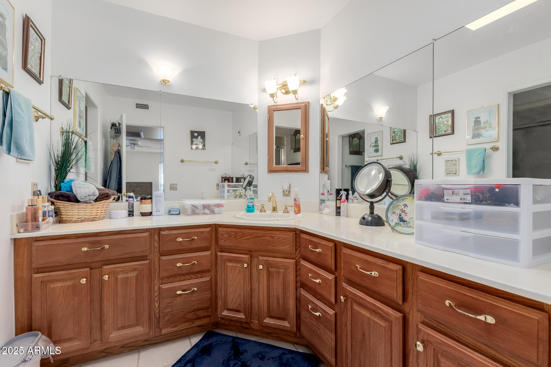 10023 West Pleasant Valley Road Sun City, AZ 85351 - Photo 14 of 41 a spacious bathroom with a sink double vanity granite and a mirror