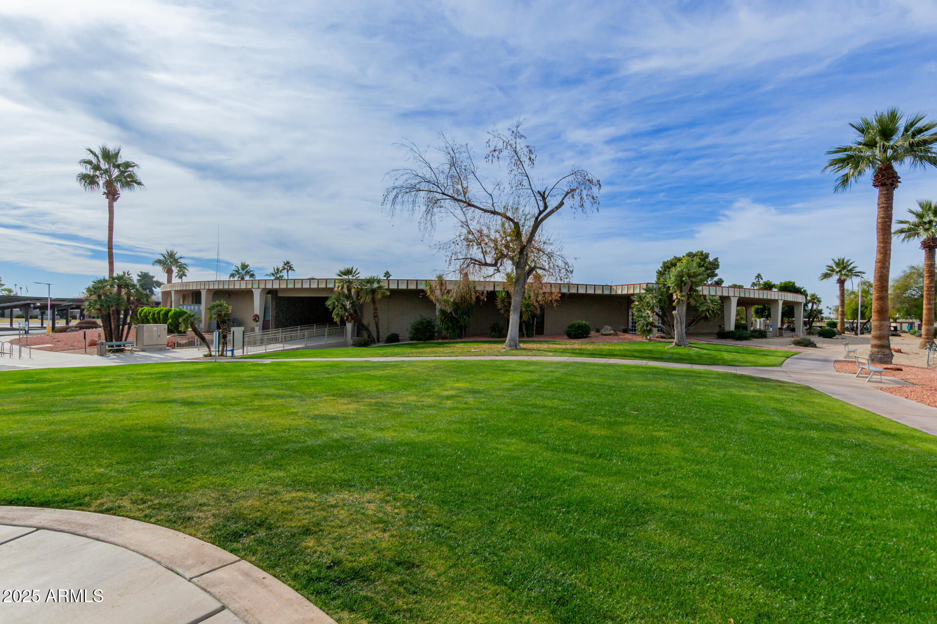 10023 West Pleasant Valley Road Sun City, AZ 85351 - Photo 27 of 41 a view of yard with swimming pool and green space