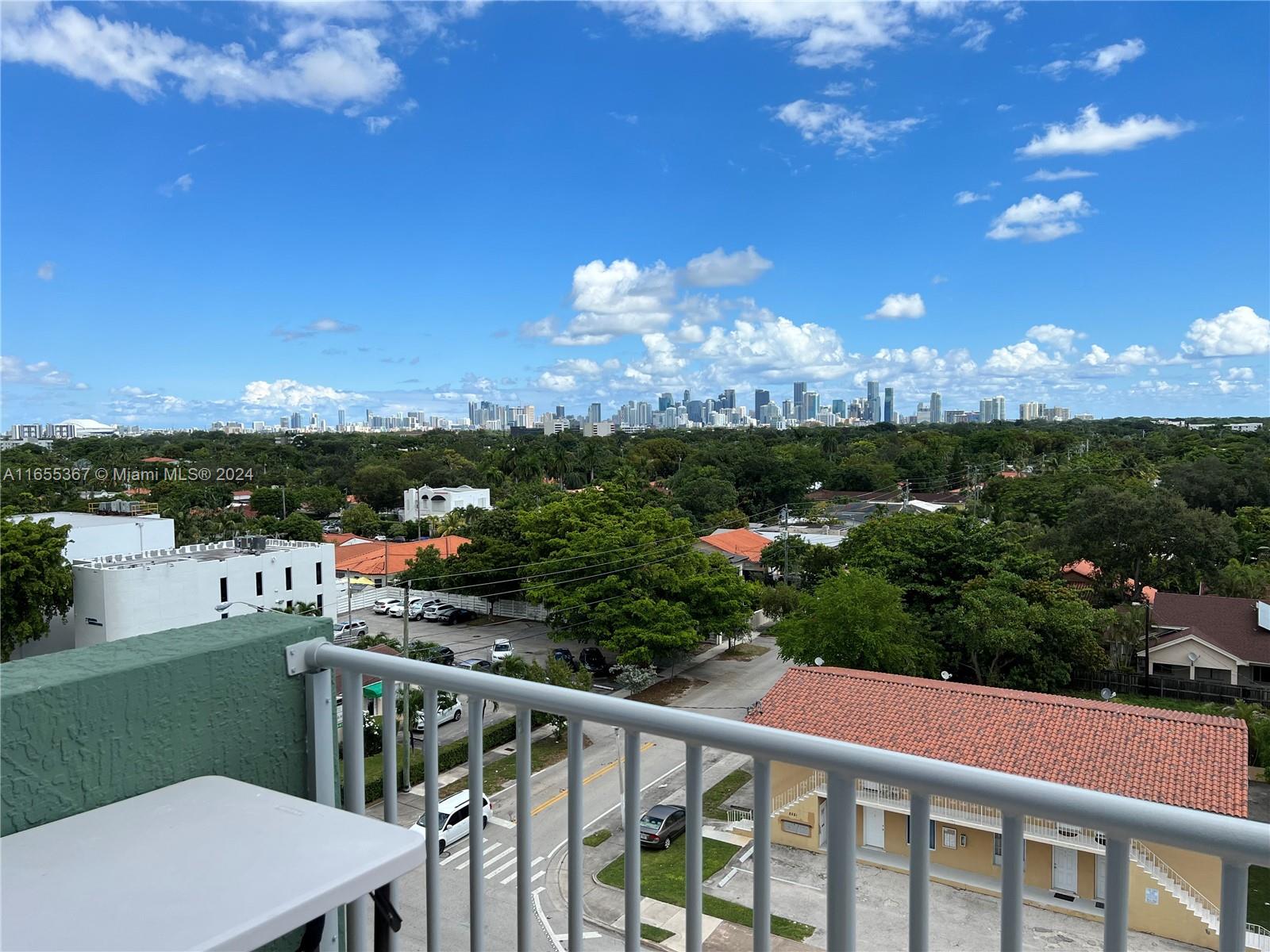 2550 Southwest 27th Avenue, Unit 703 Miami, FL 33133 - Photo 14 of 18 a view of a city from a balcony
