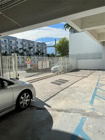 a view of balcony with furniture