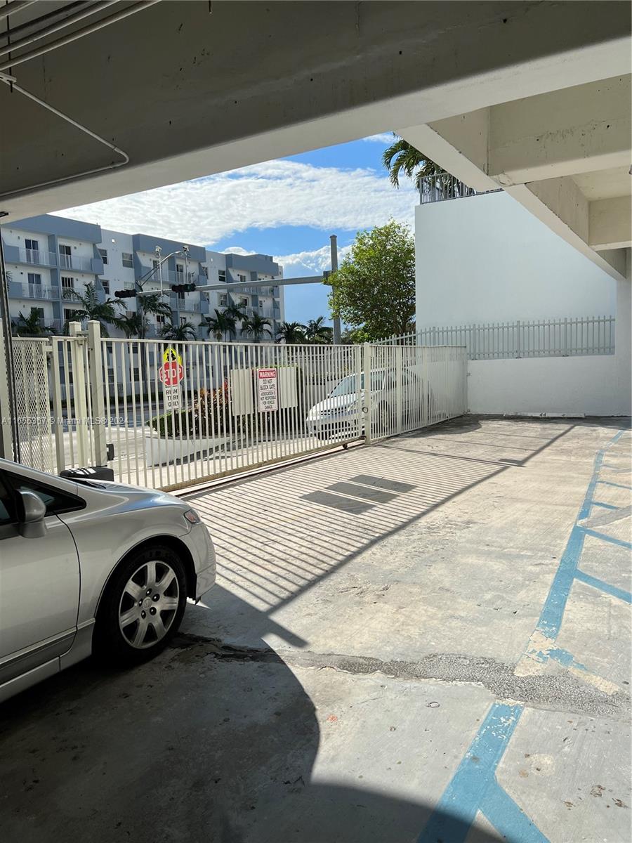 2550 Southwest 27th Avenue, Unit 703 Miami, FL 33133 - Photo 17 of 18 a view of parking area