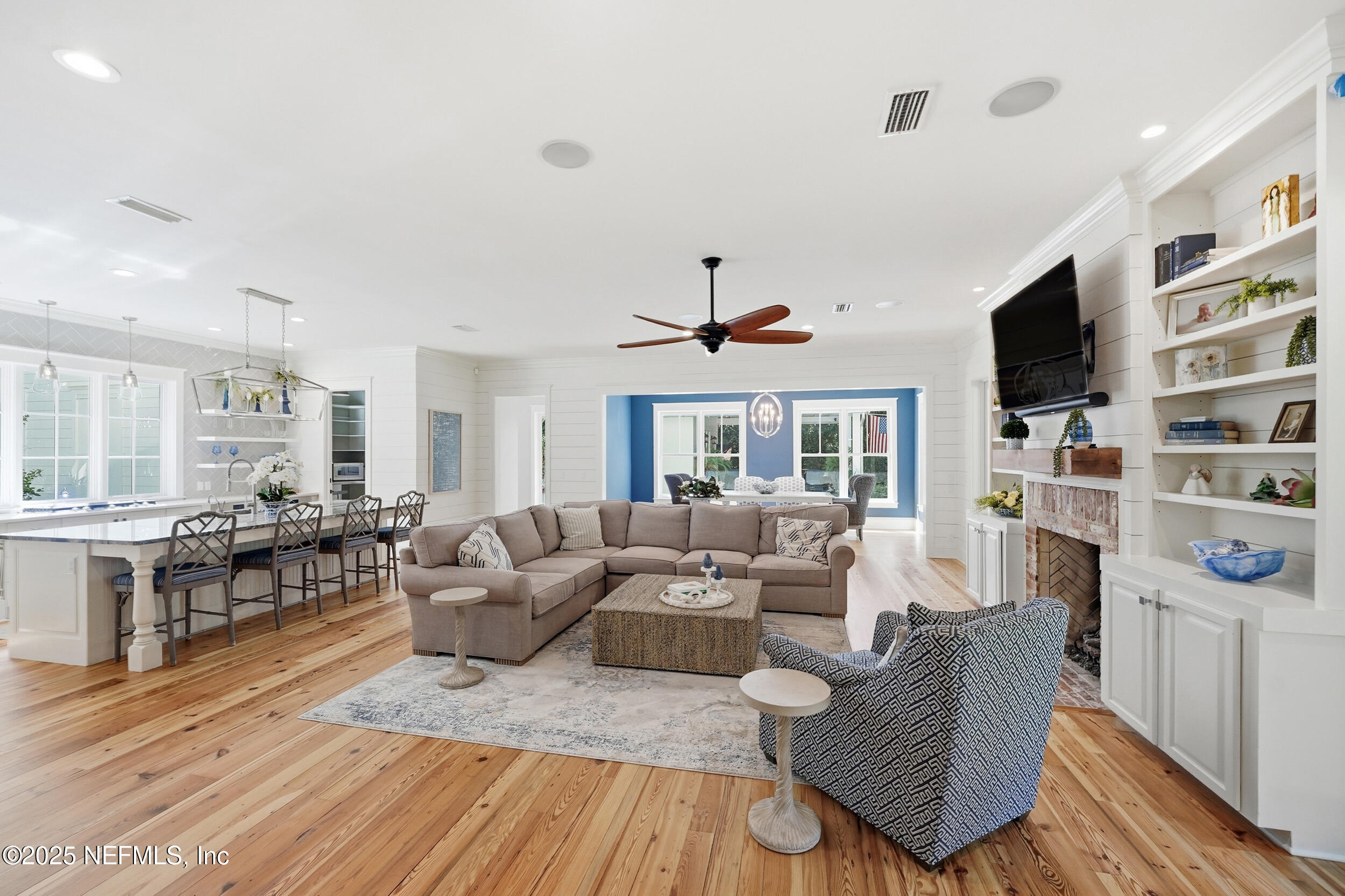 4745 Palm Valley Road Ponte Vedra Beach, FL 32082 - Photo 22 of 104 a living room with furniture and a flat screen tv