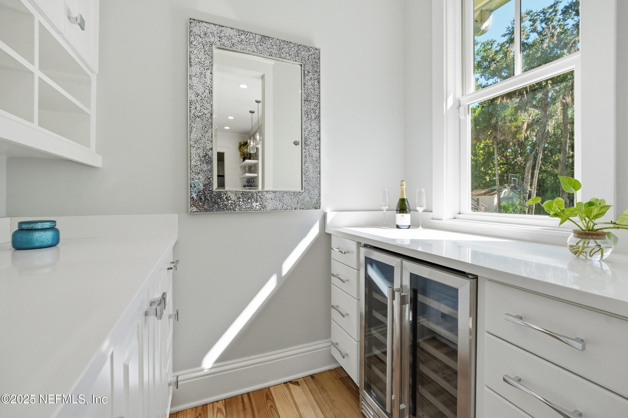4745 Palm Valley Road Ponte Vedra Beach, FL 32082 - Photo 28 of 104 a bathroom with a sink and a mirror