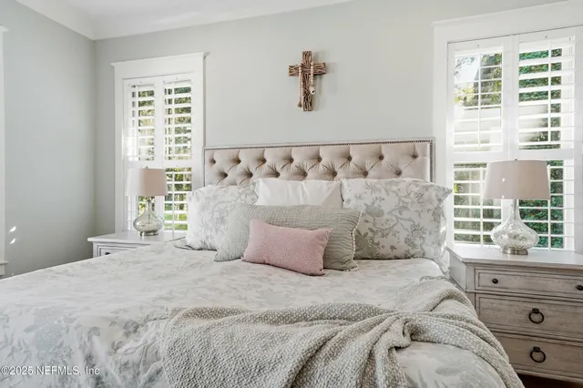 a view of a bathroom with a tub sink and mirror