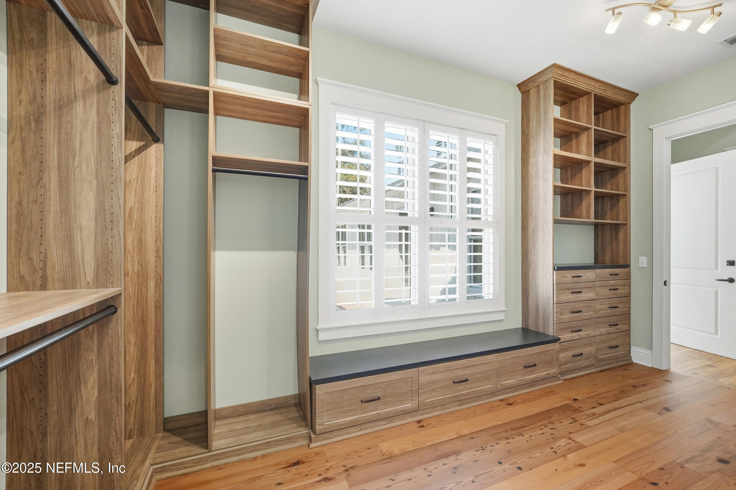 4745 Palm Valley Road Ponte Vedra Beach, FL 32082 - Photo 41 of 104 a view of an empty room with wooden floor and a window