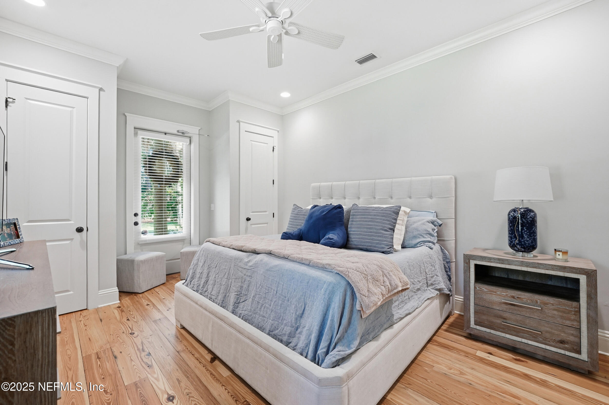 4745 Palm Valley Road Ponte Vedra Beach, FL 32082 - Photo 43 of 104 a bedroom with a bed and a dresser