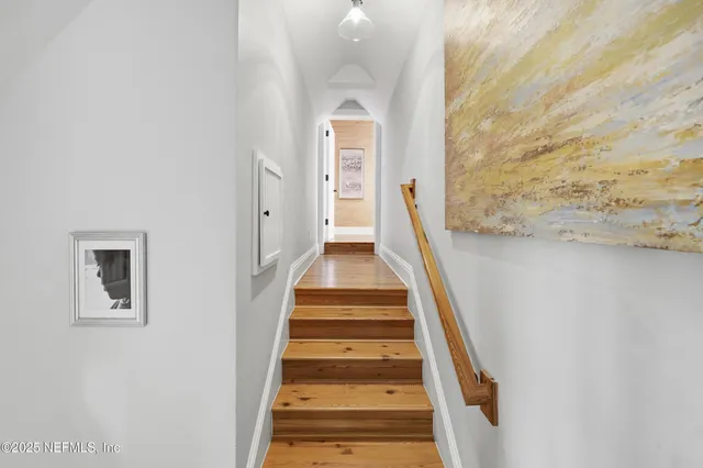 a backyard of a house with lots of green space and garden