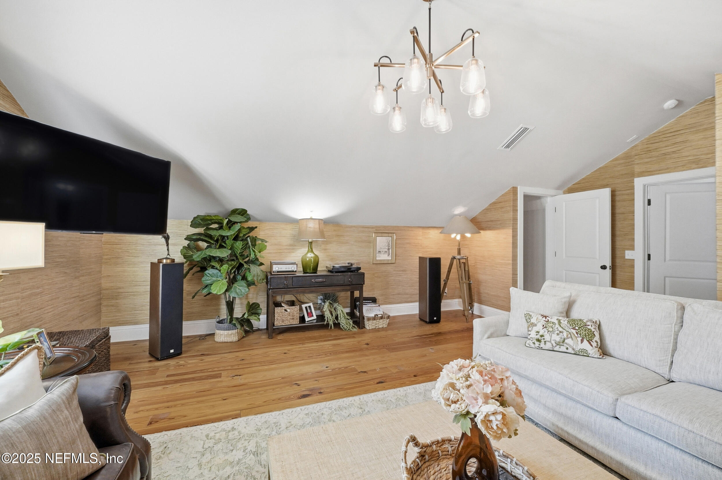 4745 Palm Valley Road Ponte Vedra Beach, FL 32082 - Photo 51 of 104 a living room with furniture and a flat screen tv