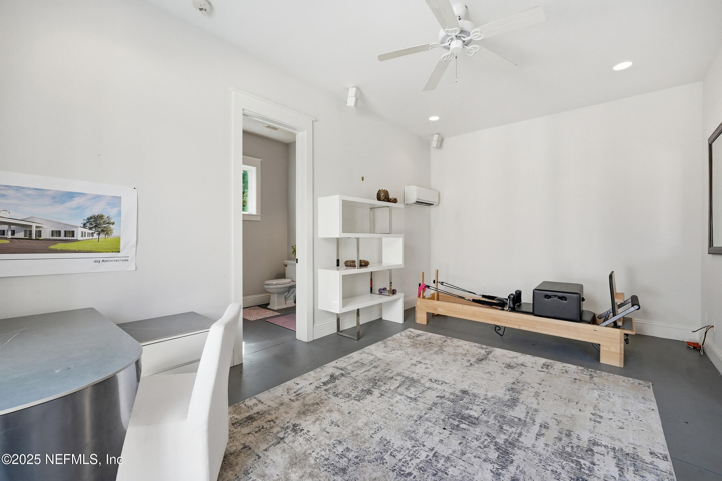 4745 Palm Valley Road Ponte Vedra Beach, FL 32082 - Photo 76 of 104 a living room with furniture and a flat screen tv