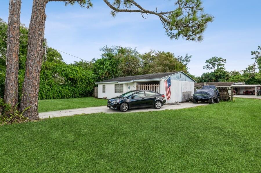 5718 Dryden Road West Palm Beach, FL 33415 - Photo 2 of 10 5718 DrydenRd Exterior Front