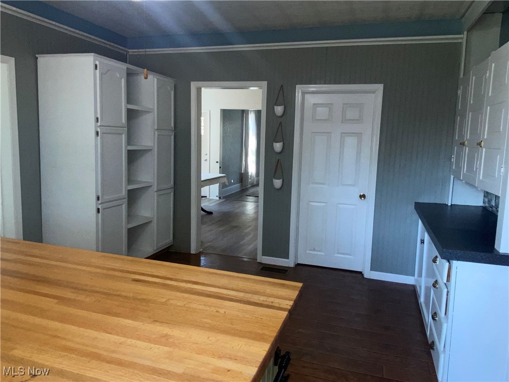 3016 Wadsworth Road Norton, OH 44203 - Photo 9 of 50 Kitchen with white cabinets and LVP flooring