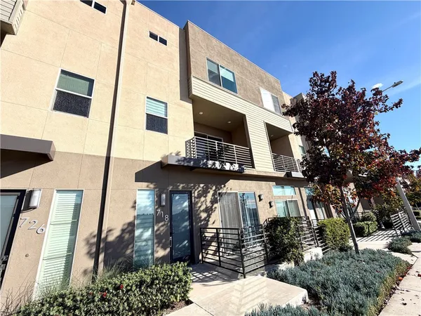 a front view of a building with street view