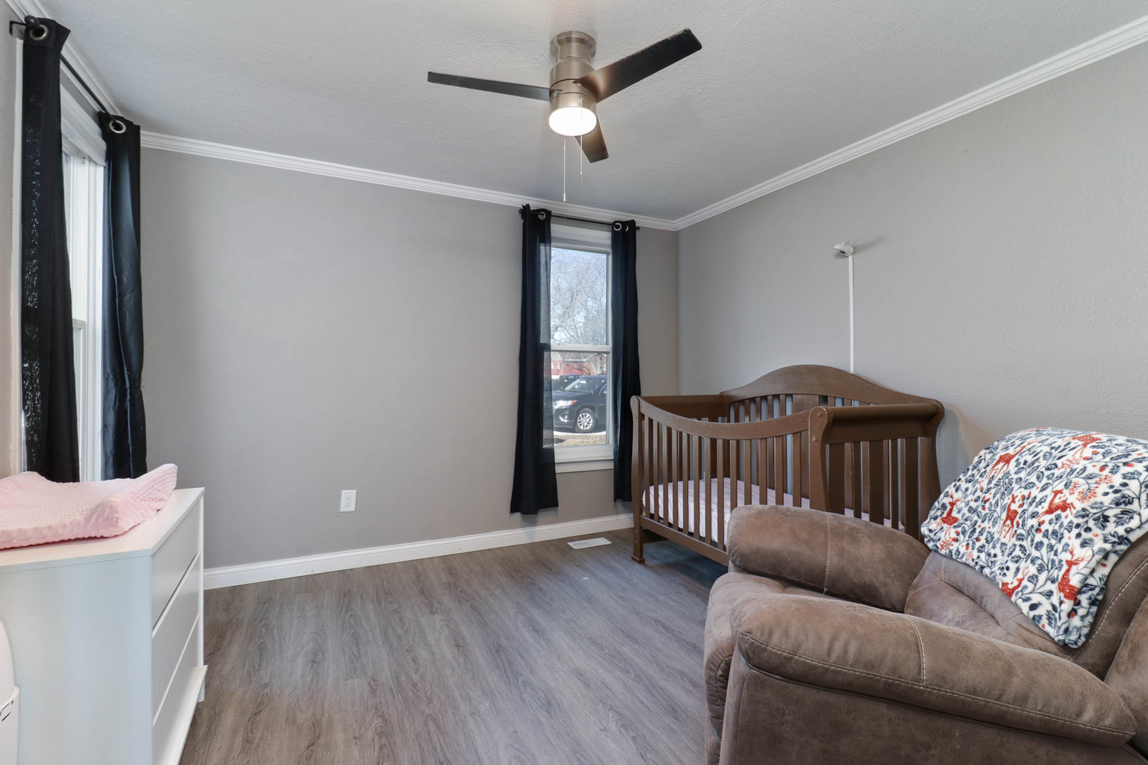 207 Field Street Secor, IL 61771 - Photo 22 of 30 a bedroom with furniture and wooden floor