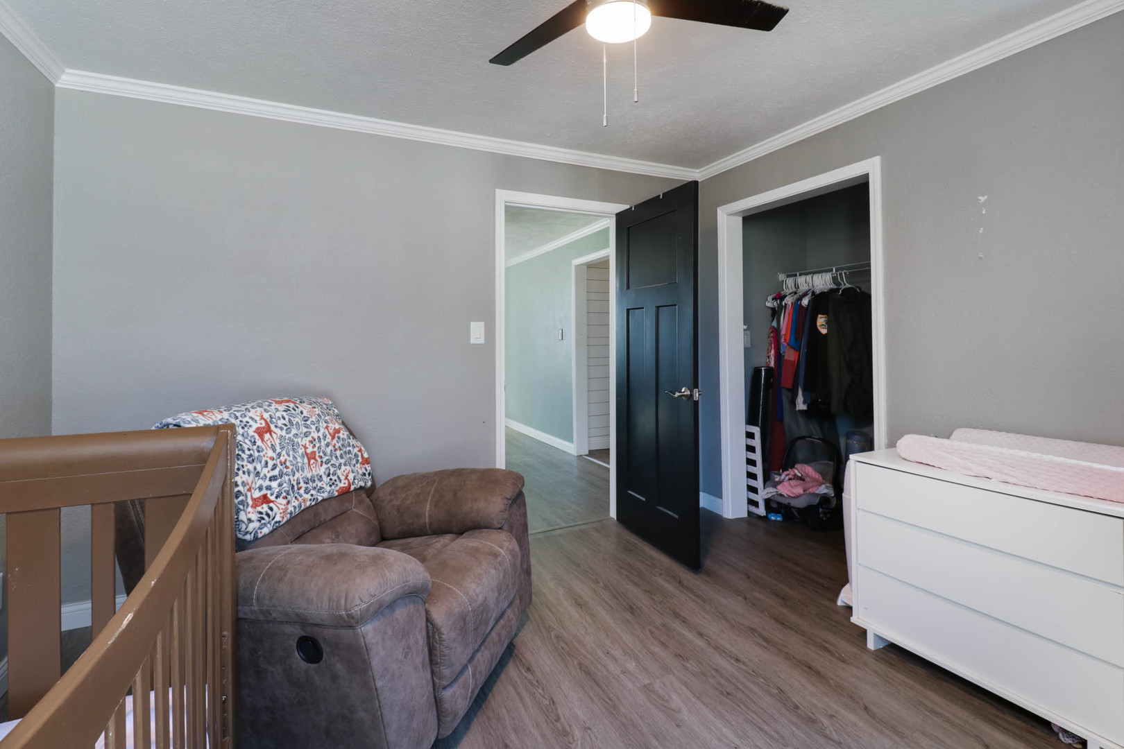 207 Field Street Secor, IL 61771 - Photo 23 of 30 a living room with furniture and a wooden floor