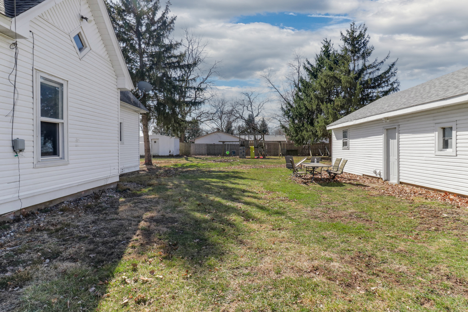 207 Field Street Secor, IL 61771 - Photo 28 of 30 a view of a backyard with large tree