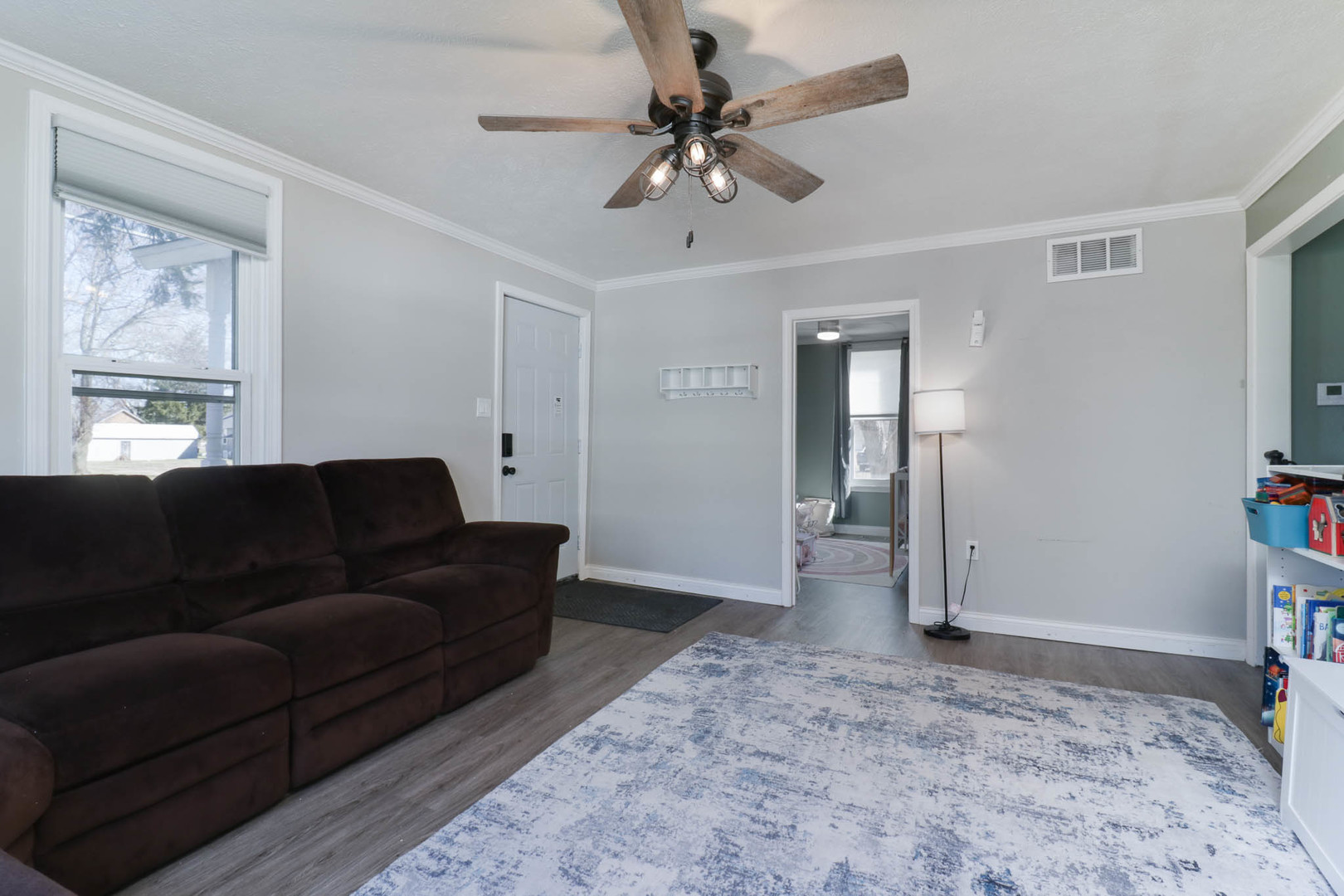207 Field Street Secor, IL 61771 - Photo 5 of 30 a living room with furniture and a rug