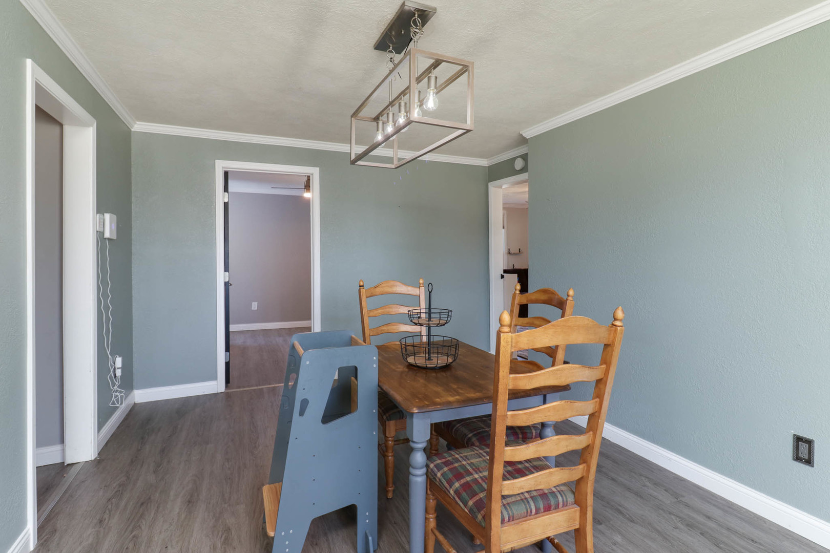 207 Field Street Secor, IL 61771 - Photo 7 of 30 a view of a workspace with furniture and wooden floor