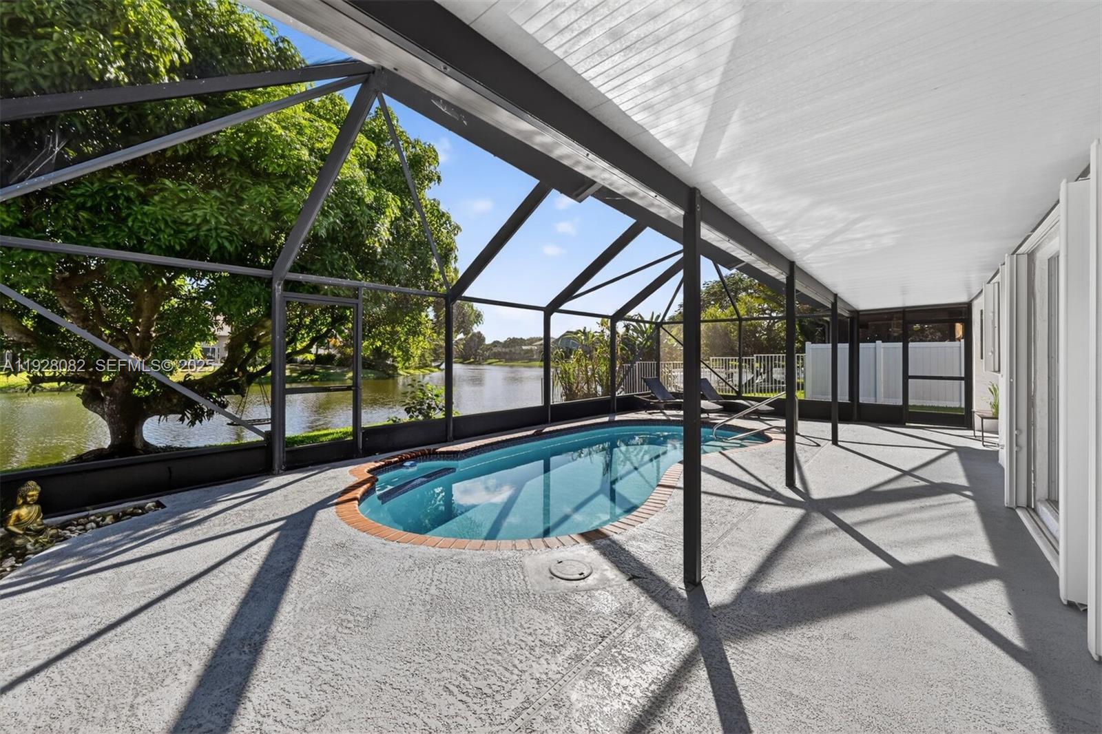 720 Rock Hill Avenue Davie, FL 33325 - Photo 19 of 27 a view of a chairs and table in the balcony