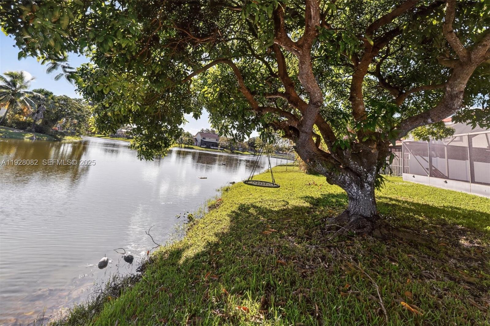720 Rock Hill Avenue Davie, FL 33325 - Photo 23 of 27 a view of a lake