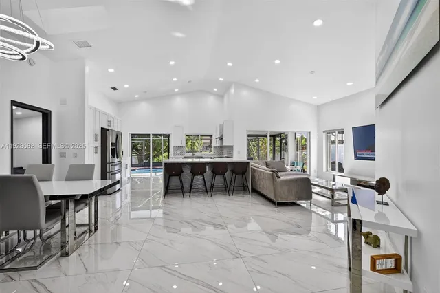 a living room with furniture and a table