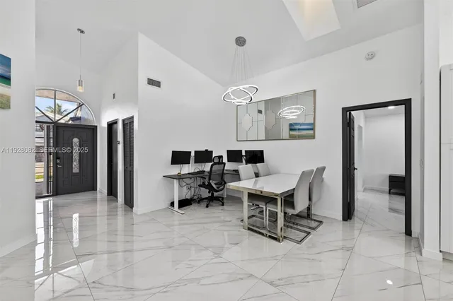 a view of a livingroom with furniture and window