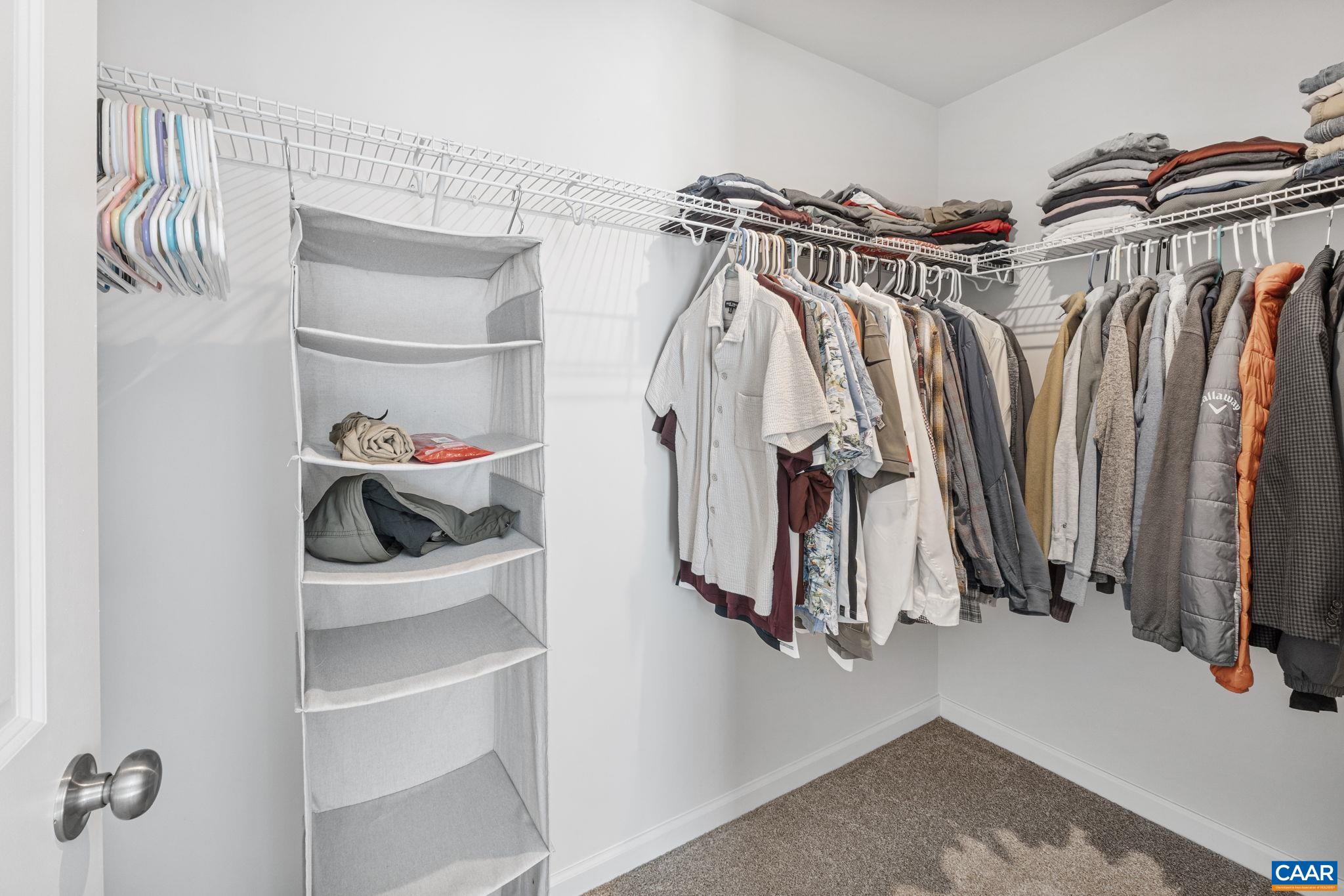 124 Shady Court Waynesboro, VA 22980 - Photo 16 of 32 a view of walk in closet with clothes and shoes