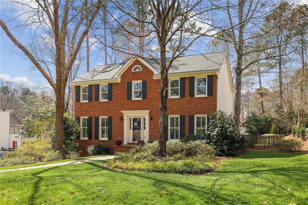 515 Ridgemont Drive Roswell, GA 30076 - Photo 1 of 1 Brick front traditional with all new windows and sprinkler system in the front yard