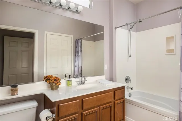 a view of an house with backyard porch and sitting area