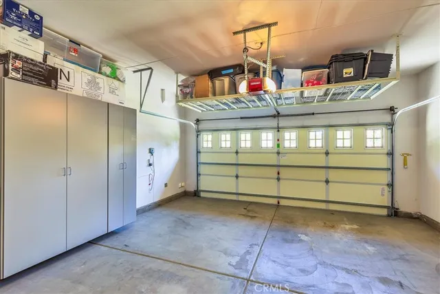 a view of an chairs and table in patio