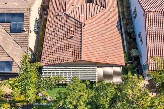 a view of a swimming pool with an outdoor space and seating area